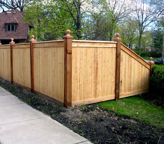 Wood fencing can make a home feel more traditional with the added benefit of privacy.